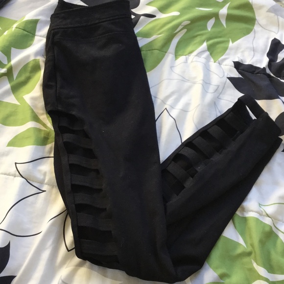 Black rayon skinny pants with cut sides