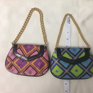 Small bag with gold chain handle. Fabric material