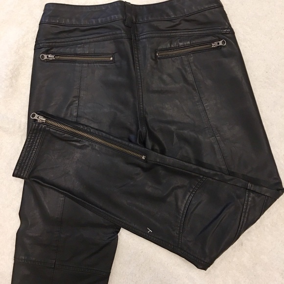 Free People straight leg vegan pants in black.