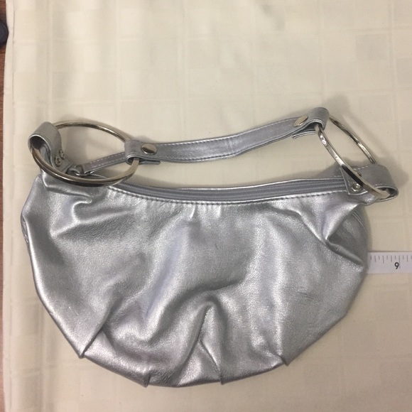 Silver bag with zipper closure