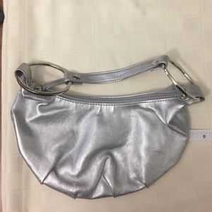 Silver bag with zipper closure