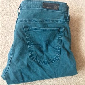 Faded teal skinny jean