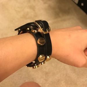 Gold studded black bracelet wrap w/buckle fasten