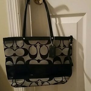 Black and gray coach purse