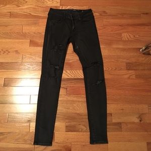 Black mid-rise skinny jeans