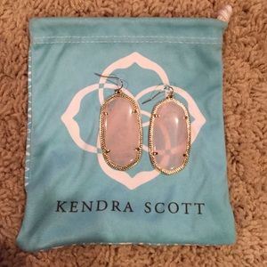 Danielle, Kendra scott earrings in light pink.