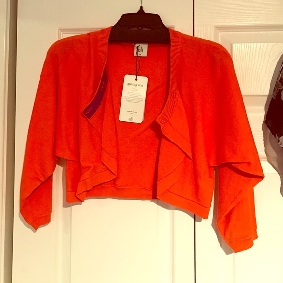 Cabi: piccolo shrug