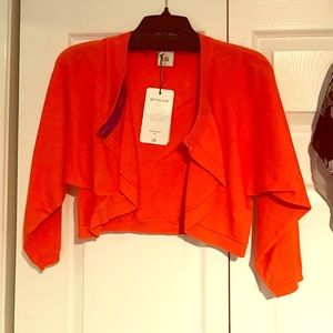 Cabi: piccolo shrug