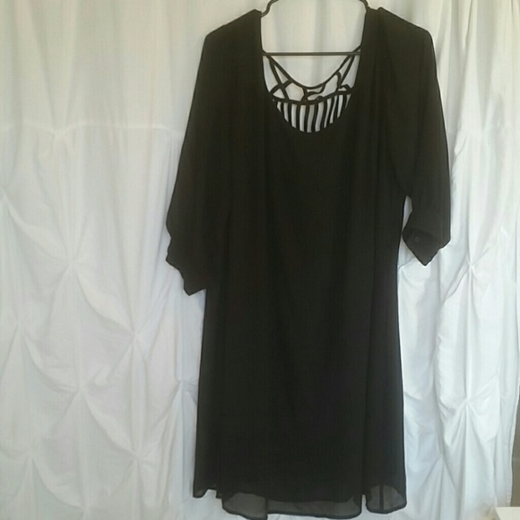 Plus-size black dress with back cutouts