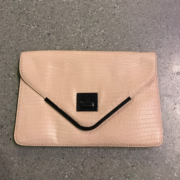 BCBG Handbags - BCBG •Faux snake skin Clutch