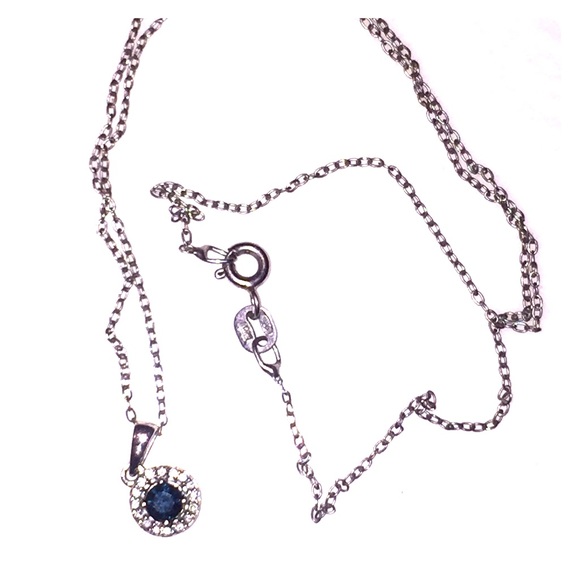 1/2 carat Blue Diamond necklace with diamond halo