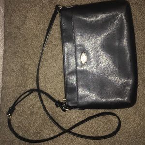 A coach purse, it's a little dirty, but good shape