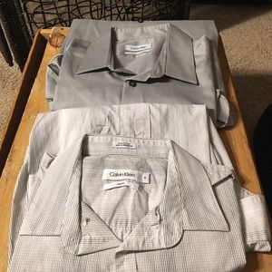 2 men's Calvin Klein dress shirts