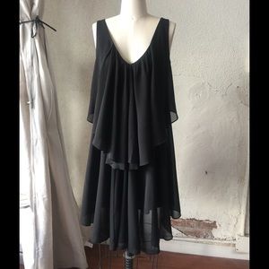 Stylish asymmetrical black flowing cocktail dress