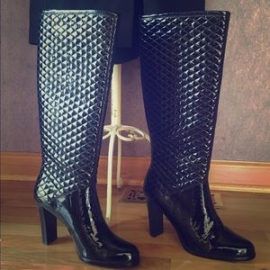 Calvin Klein black heeled boots.