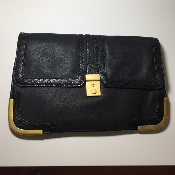 Black purse with gold chain
