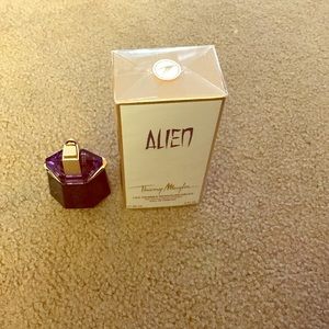 New in box, unopened bottle of Alien