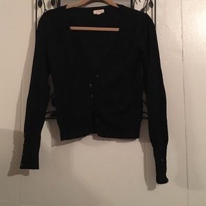 Black cardigan button accent on sleeves