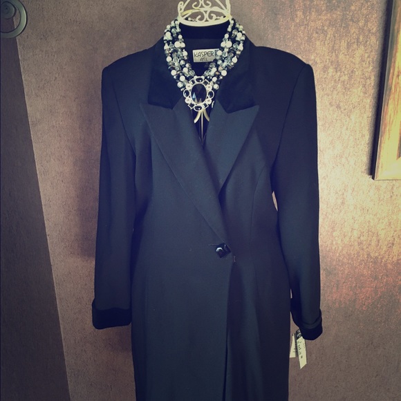 Black Kasper mid-length dress.