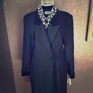 Black Kasper mid-length dress.