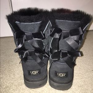 Black uggs with bows in the back