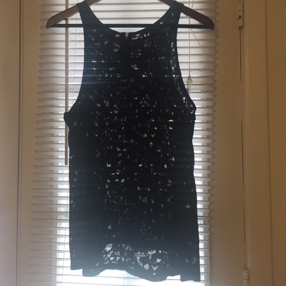 Black sleeveless high neck top