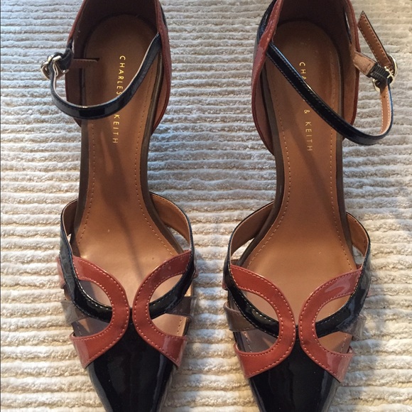Size 9- Patent leather pumps w strap. Multi color