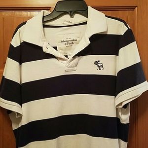 White and dark navy blue polo shirt