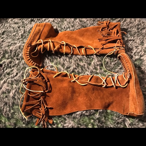 Minnetonka moccasin boots.