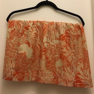 A orange and cream skirt.