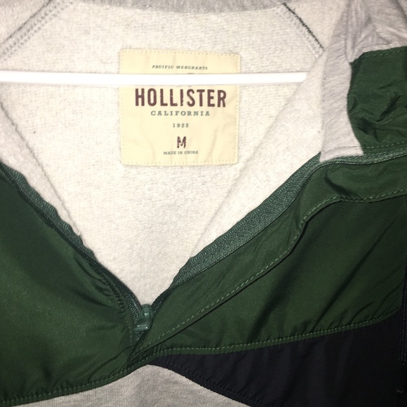 A green and grey pullover w: navy blue on the arm - Picture 2 of 2