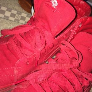 All red Hightop Vans