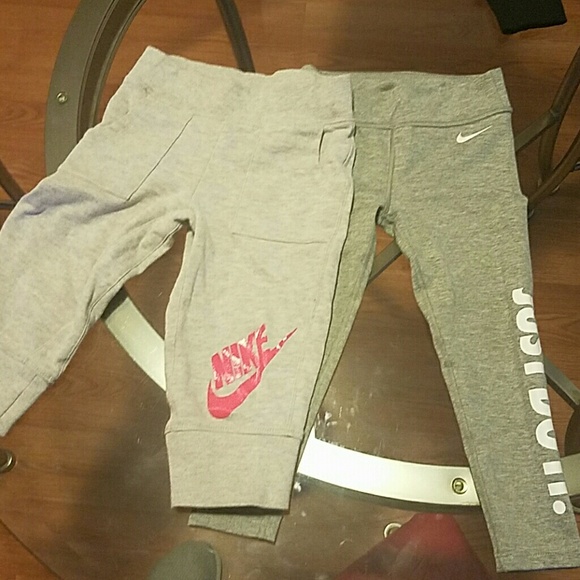 2 pairs of Nike pants