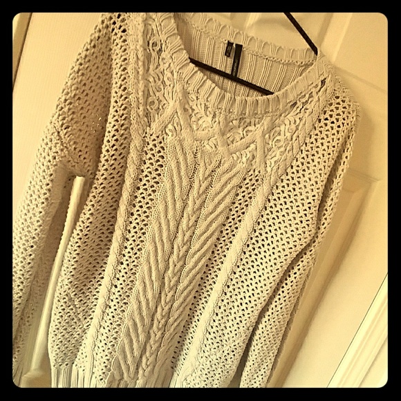 Loose knit sweater with lace accents