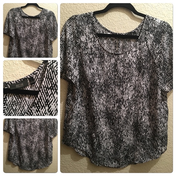 Great light weight blouse. Never worn.
