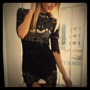 Xenia boutique  black and nude lace size 6(xsmall)