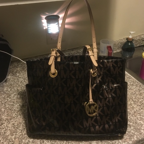 MK black and gold purse