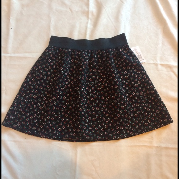 Black flower quilted skirt.
