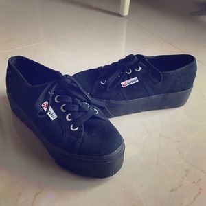 Black platform sneakers