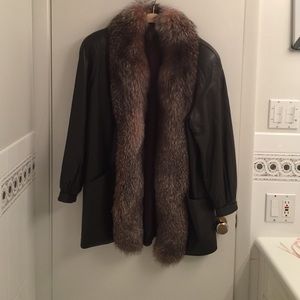 Brown leather fox trimmed coat. Like brand new !!