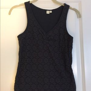 V-neck sleeveless tank with cutout flower pattern