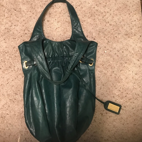 Badgley Mischka hunter green leather handbag.