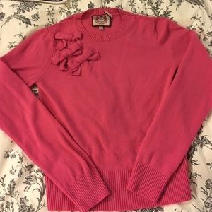 Pink wool sweater with bows