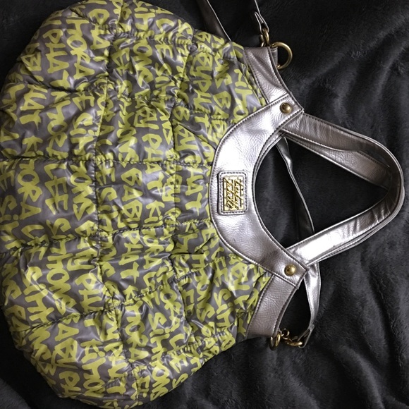 Baby phat handbag. Small flaw, see pictures.