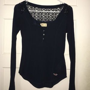 Navy long sleeve shirt.