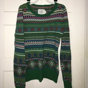 Green Christmas sweater.