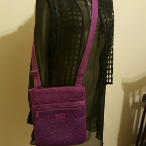 Mickael kors purple satchel handbag used