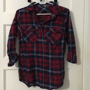 Red and navy flannel with arm cuffs.