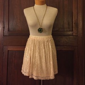 Cream colored sequined skirt