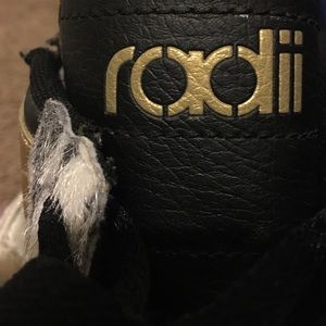 Radii gold and black sneaker